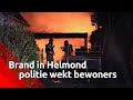 Politie wekt bewoners huis, omdat aanbouw in brand staat.
