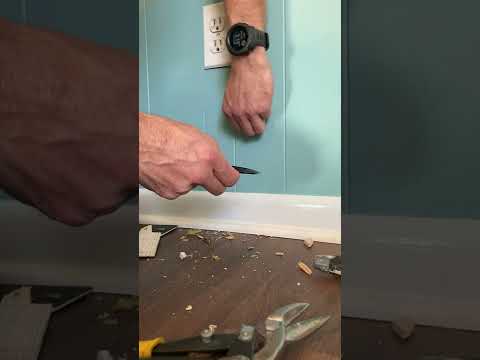 Hole patch in wood paneling