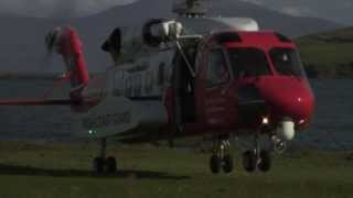 preview picture of video 'JSAR 2013 flag is delivered via an Irish Coast Guard helicopter, Dingle, County Kerry.'