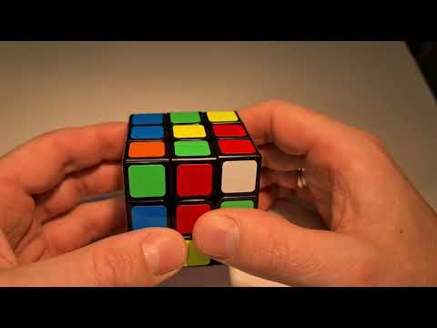 Solving a Rubik's Cube: Simple, slow, and with instructions for beginners. Summary in the appendix.