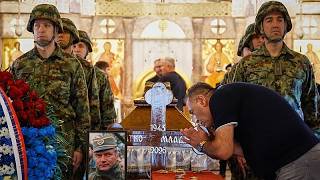 Thousands attend Bosnian Serb war criminal's funeral in Belgrade despi