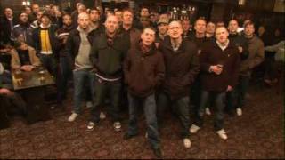 Football hooligans singing song