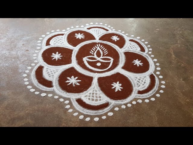 Muggulu rangoli design for kathigai month
