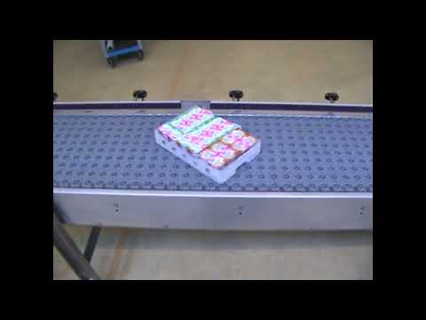 Retourneur à galets orientés pour les produits à fond plat et rigide_2