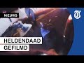 Bodycam: man uit brandende auto gesleurd
