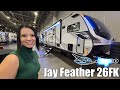 Check out this Video for a 2026 Jayco Jay Feather 26FK(Stock #T128221)  for sale by Blue Compass RV Des Moines. This unit is located in Altoona, IA