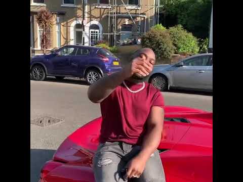 Smerker - pulls up in a Ferrari flexing baguette diamond chain and previews new song