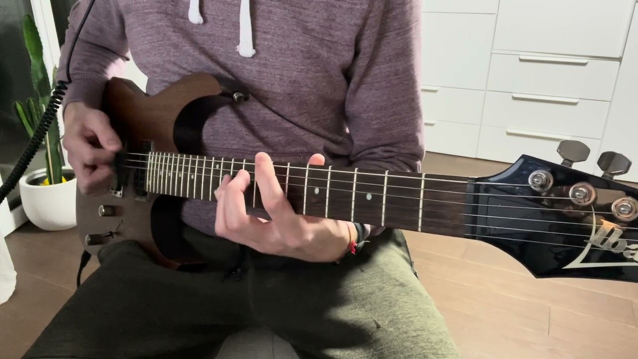 Roberto Barlocci playing the main riff of Amon Amarth's The Pursuit of Vikings on electric guitar.