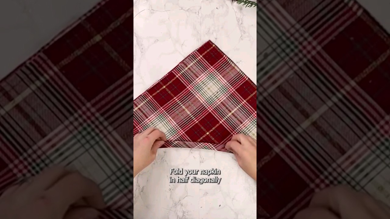 Look how I folded this Christmas napkin! 🎄 #diychristmasdecor #tablesettings