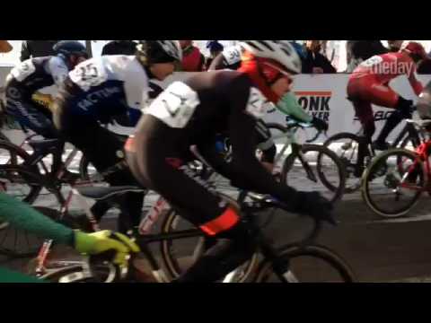 Racers bolt off the starting line in the Cyclocross National Championship men's elite race.