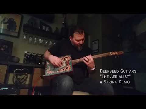 Deepseed Guitars - "The Aerialist."  4 String Cigar Box Style Guitar with Lace Matchbook Pickup