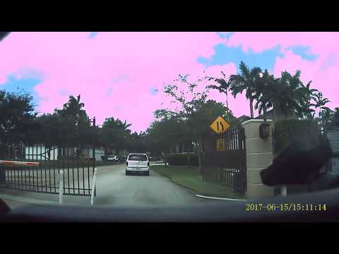 woman drives into gate escalade CVH H41