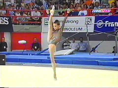 Incredibly FLEXIBLE GYMNAST stretches her body on the competition.