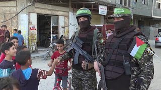 Members of Hamas armed wing parade in Gaza City
