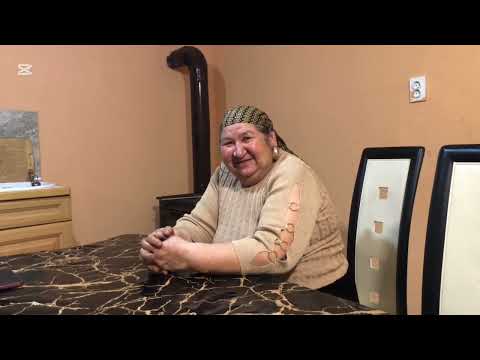 Maria is talking to her daughter-in-law by the stove in the kitchen, Jamila!