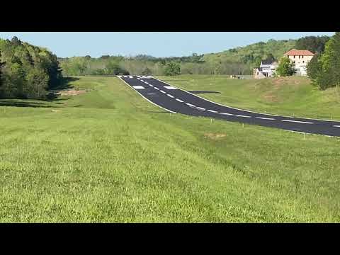 Cessna 177RG Cardinal RG Low pass at KFGU