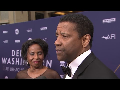 As he picked up an AFI Life Achievement Award, actor Denzel Washington looked back on his early career and praised "old friend" Spike Lee. (June 7)