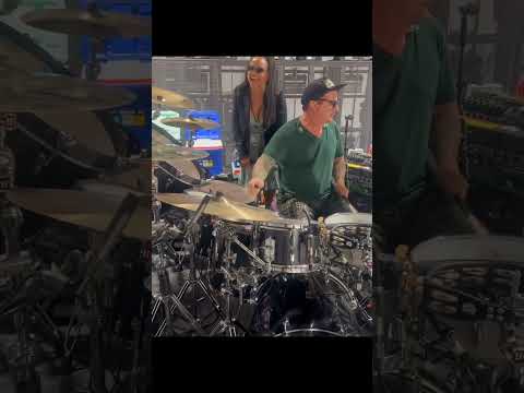 Tre Cool absolutely rocking out on Cherisse Osei's kit from Simple Minds