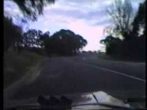 My HB Torana Passing a VN Police Car - 1990 - Kew Boulevard - Melbourne.
