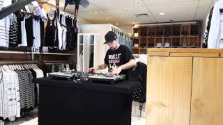 Dj Spell filming in Crate Clothing Store