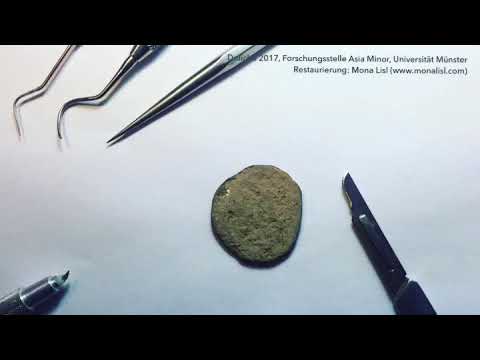 Restaurierung einer römischen Münze