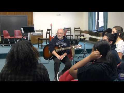 Bubs Mckeg mentoring the vocalists at Hope Academy