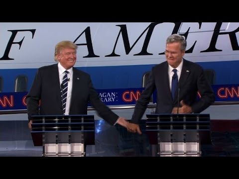 Trump gives Bush a low-five after debate joke