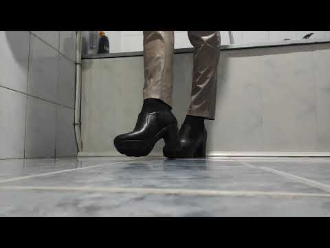 wet leather pants, wet leather boots.