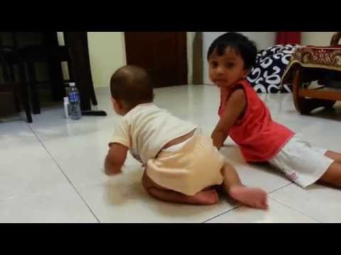 Deepra playing with his little sister Dyuti