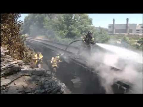 Firefighters Put Out Flames on Railroad Bridge in St. Paul