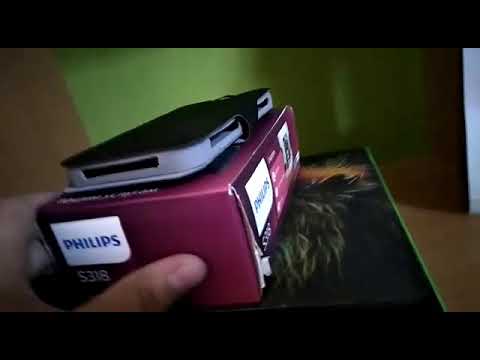Распаковка телефона Philips s318