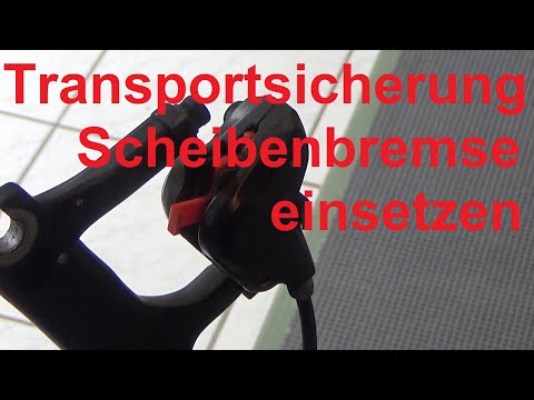 Bicycle disc brake transport lock insert avoid mistakes transport lock