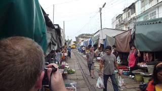 preview picture of video 'Maeklong Train Market near Bangkok Thailand.'
