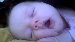 Kate sleeping on daddy and Claire reading to lily.