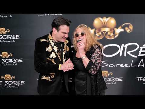 Grammy Winner Hamid Saeidi of Opium Moon and Annemarie Picerno on the The Soiree Red Carpet