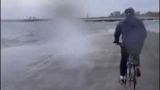 preview picture of video 'Chicago Lakefront Bicycle Wave Shower'