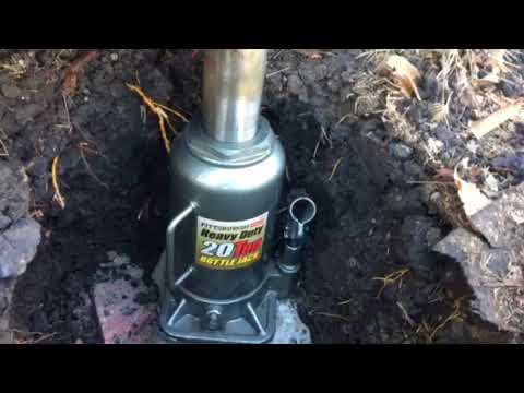 Part of a video titled Jacking up a shipping container. - YouTube