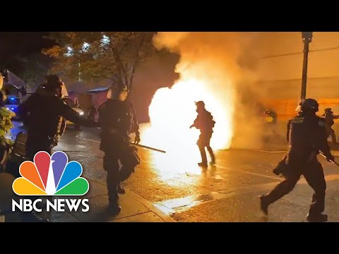 Watch: Molotov Cocktails Are Thrown At Police Officers In Portland Protests | NBC News NOW