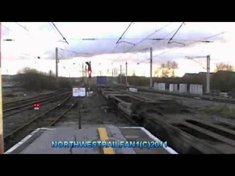 92022 WAS WORKING THE 4M63 MOSSEND TO HAMS HALL AT WARRINGTON BANK QUAY ON THE 18 01 2011