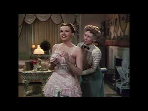 Trailer still: Judy Garland and Van Johnson in a turn-of-the-century Chicago music shop, echoing the film’s song-led storytelling