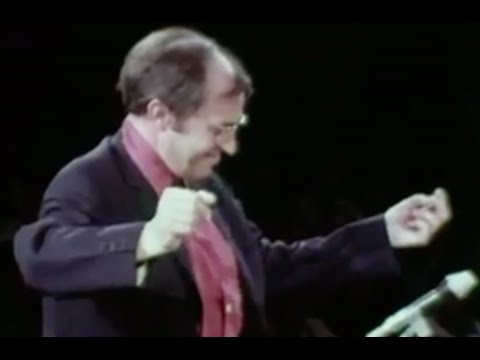 Boulez laughing while conducting