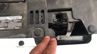 Mazda 3 - Sliding latch to open up hood