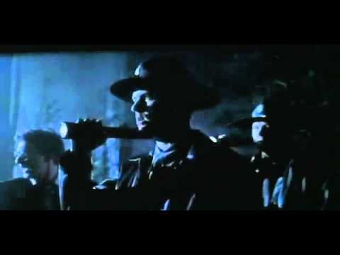 Tráiler En la Oscuridad de la Noche 2003