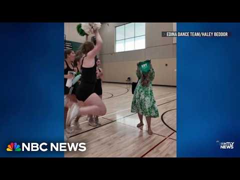Good News: High school dance coach surprises her team with pregnancy announcement