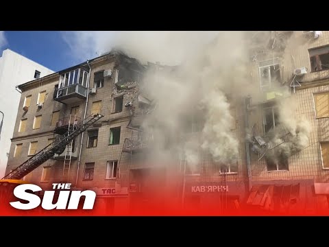 Ukrainian firefighters search for survivors after Russian strike in Kharkiv city centre