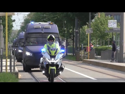 9X Politie Motoren begeleiden 8X ME + 3 onopvallende Politie wagen over de Noorderlaan in Antwerpen