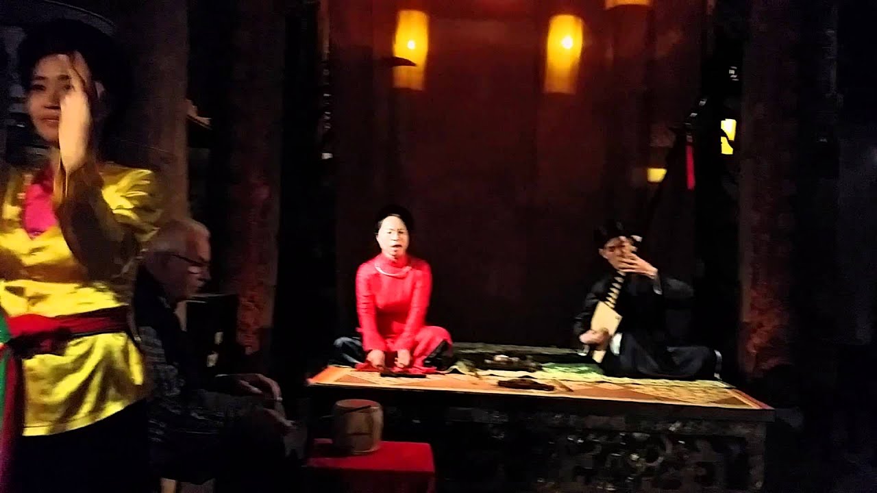 Experience the captivating visuals of a Ca Tru Traditional Music Performance.