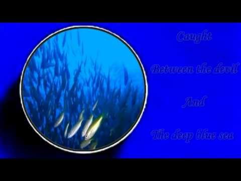 Chris Rea - Between The Devil And The Deep Blue Sea (Lyrics)