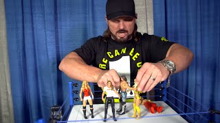 AJ Styles checks out Ronda Rousey&#39;s first WWE action figure