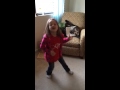 Lily rocking the air guitar to Christian Kane 